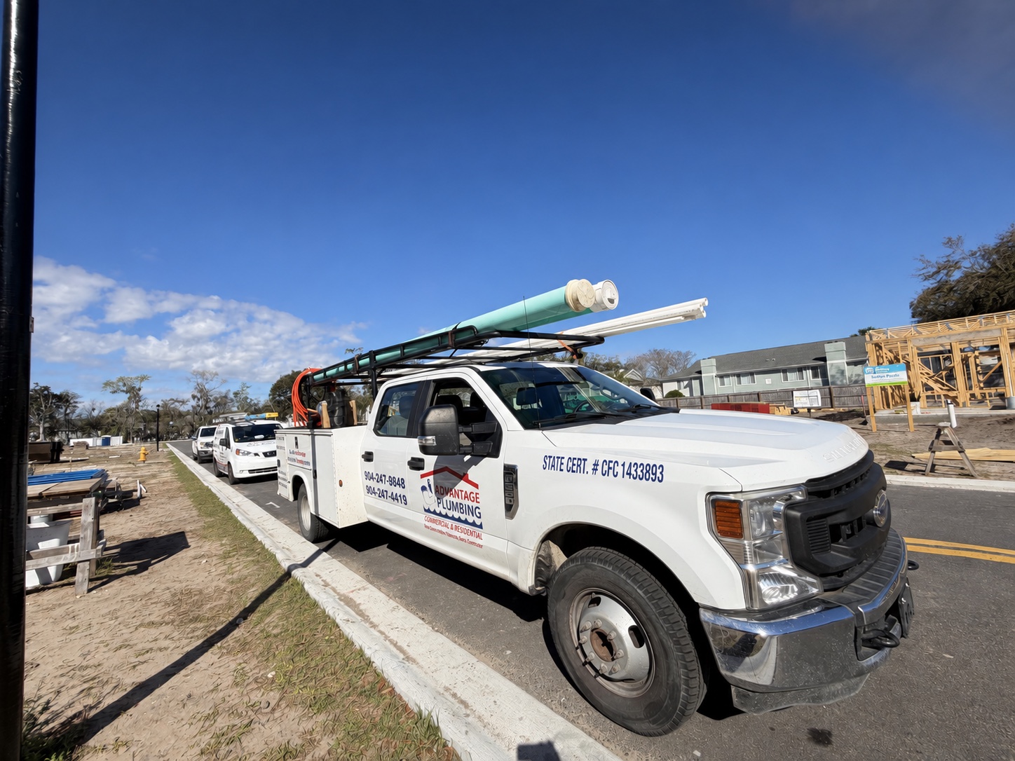 Advantage Plumbing service trucks with current licensing
