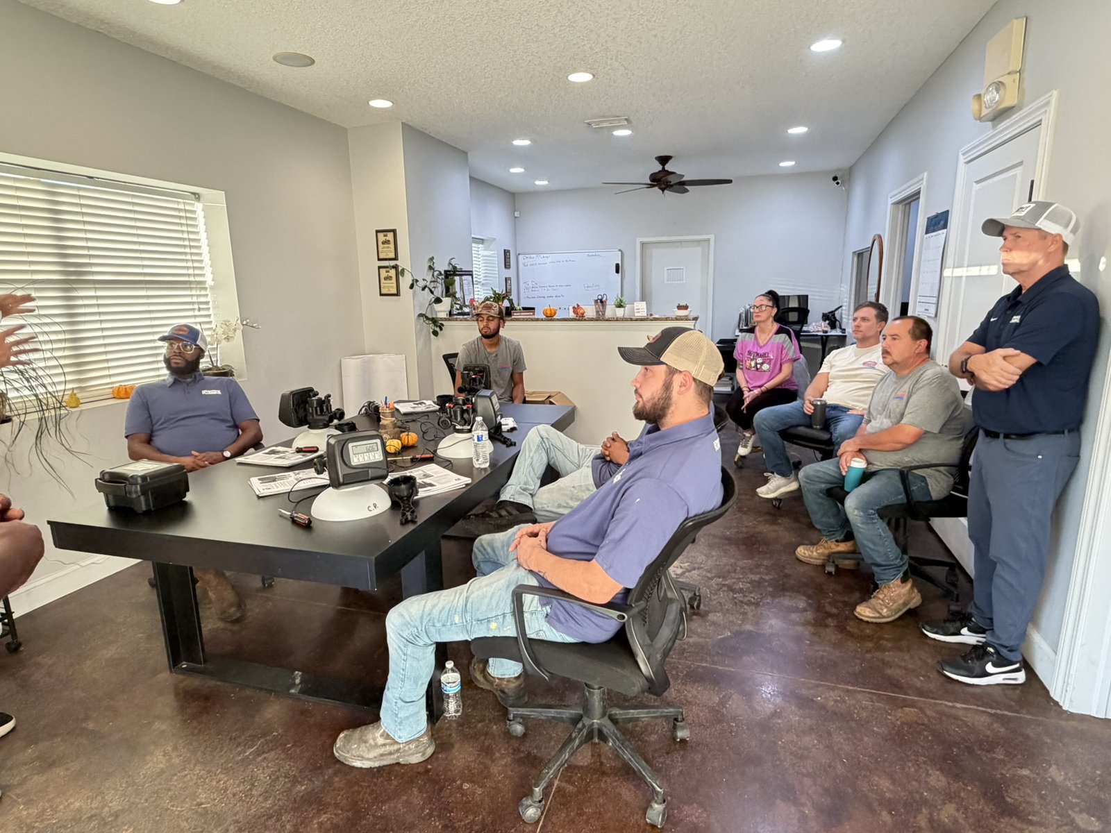 Advantage Plumbing service team attending Coast Pump water softener and carbon filtration refresher training