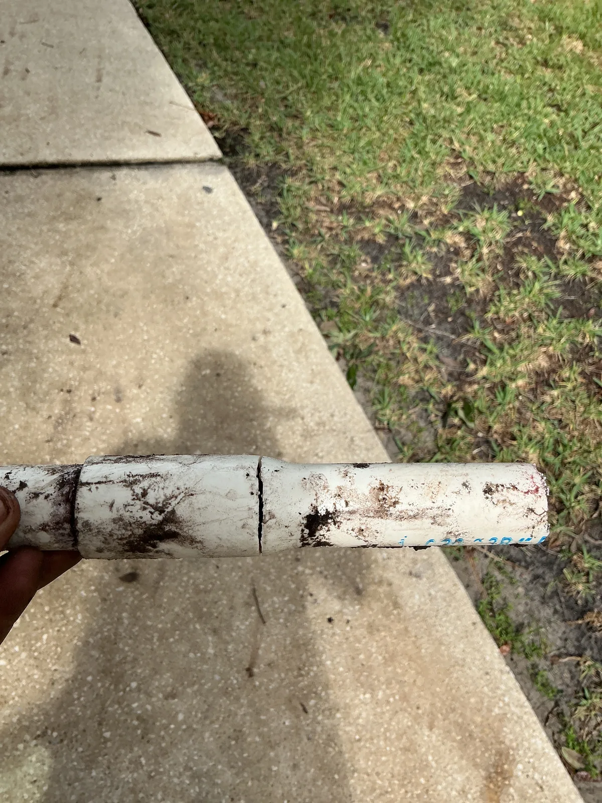 Removed water-pipe section with a visible break from the Pablo Bay repair