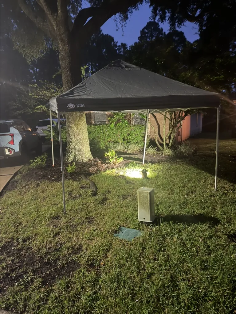Canopy and work light in the Pablo Bay yard where we stopped a water-line leak after dark