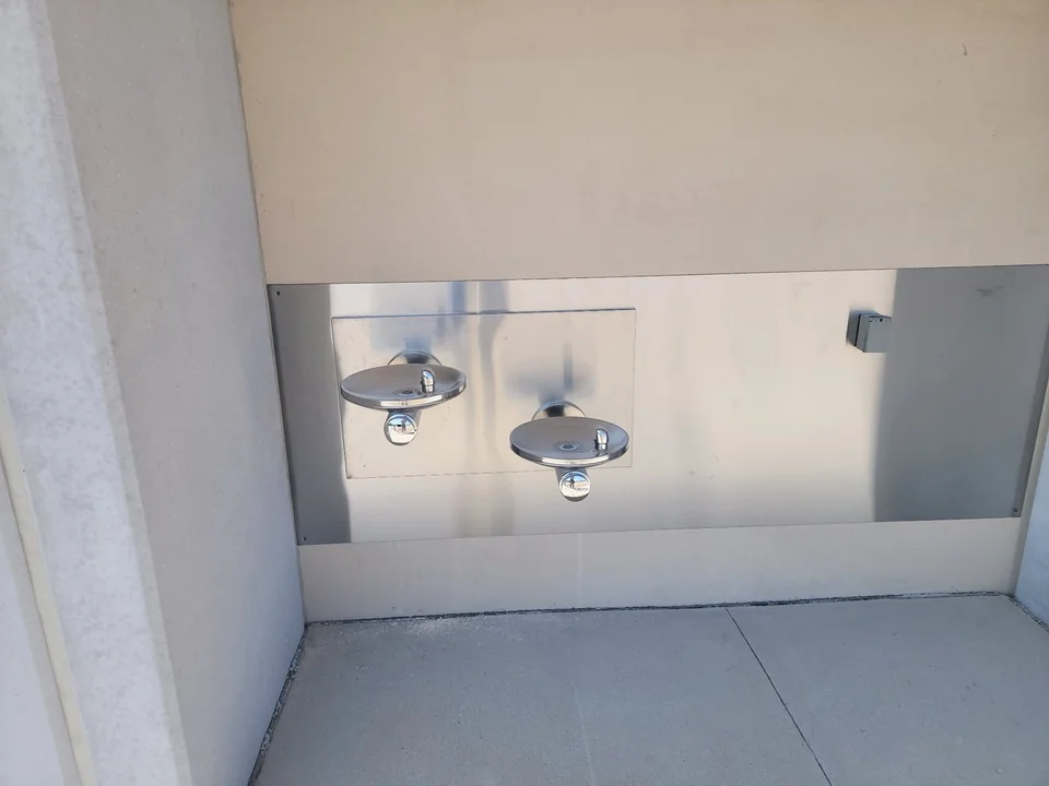 Two wall-mounted drinking water fountains installed at a recent commercial project