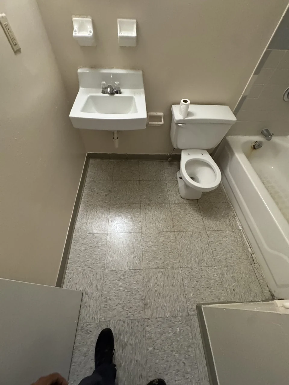 Bathroom toilet and tub before replacement for JHA