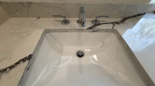 A kitchen faucet installed by Advantage Plumbing